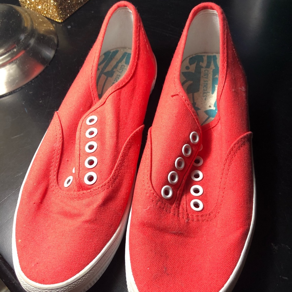 Bright orange tennis shoes